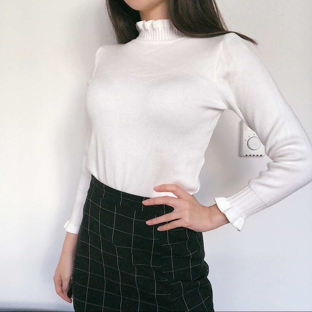 Mock neck sweater with ruffle details